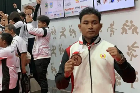 Bripda Fachoiru Zaman, Polisi Muda Samarinda Sabet Medali Perunggu Gulat di PON 2025 Kudus Bripda Fachoiru Zaman