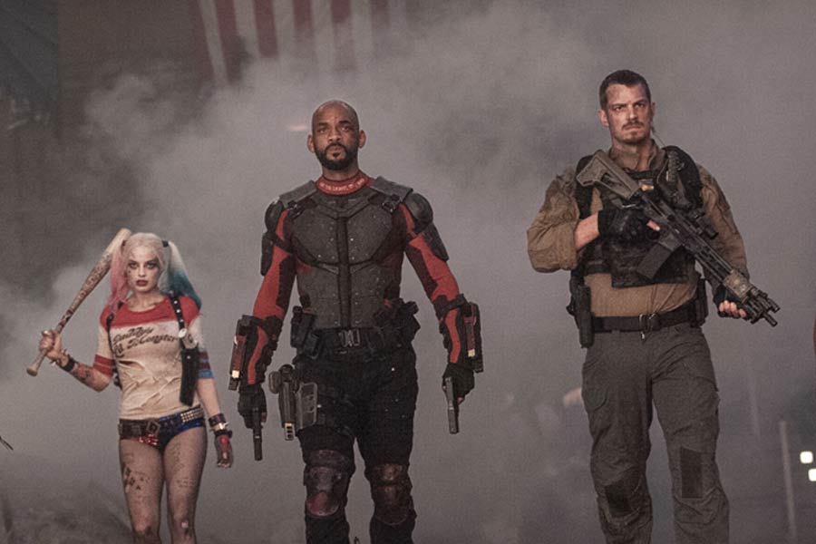 Margot Robbie, Will Smith, dan Joel Kinnaman dalam Suicide Squad (2016)