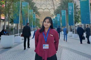 April, perempuan muda yang sempat bicara dalam sesi lokakarya bertajuk COP28 Children & Youth Pavilion Event yang mengangkat kekuatan transformatif pendidikan di tengah krisis iklim.