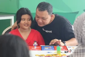 PFI Mega Life Hadirkan Board Game Literasi Keuangan Maen Do It! di Surabaya Board game literasi keuangan Maen Do It! dari PFI Mega Life